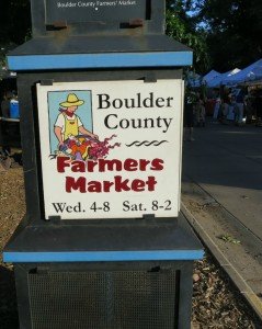 Boulder Farmers Market sign with hours of operation