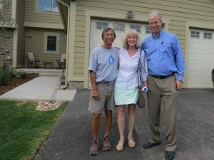 getting your home ready to sell pays off; here Bob Gordon and clients standing proudly in front of new house!